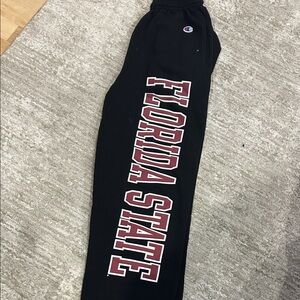 Champion Kids Black Joggers with Red Lettering